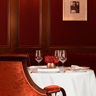 Garnet color dining area in renovated Ritz Paris