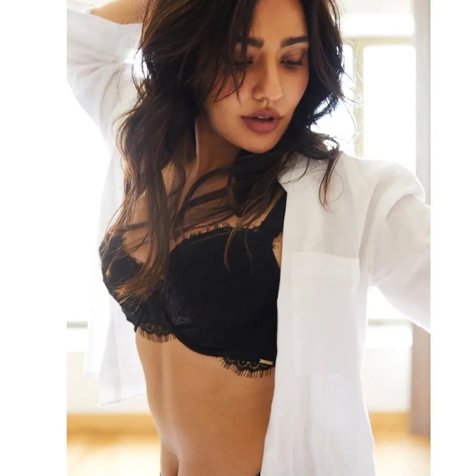 Neha Sharma black bra white shirt