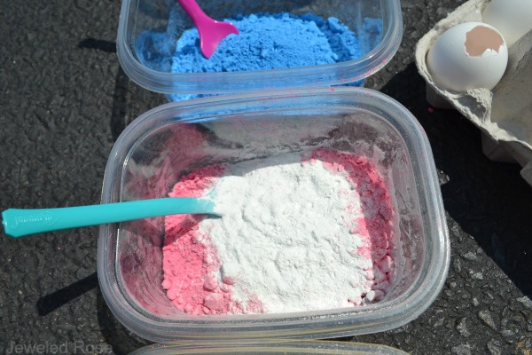 WOW the kids this summer and make chalk bombs!  This DIY sidewalk chalk activity could not be more fun. #chalkart #chalkpaint #chalkboms #smokeart #smokeboms #smokebomsdiy #sidewalkchalkart #sidewalkchalk #sidewalkchalkartideas #sidewalkchalkpaint #activitiesforkids #growingajeweledrose