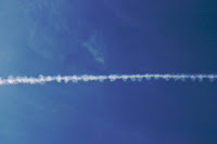 Donuts on a rope contrail. ©2006 Chris W. Johnson