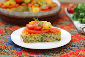 Food Lust People Love: This tomato salad topped baked spinach frittata is a delicious combination of richness from the eggs, ham and cheese and the sharp sweetness of the tomatoes with herbs. It makes a wonderful brunch, lunch or dinner dish!