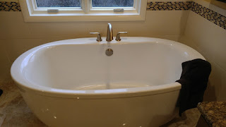 A large stand-alone bath tub