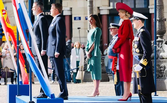 Queen Maxima wore a spain red top and skirt by Natan. Queen Letizia wore a jade green tweed dress by Moises Nieto