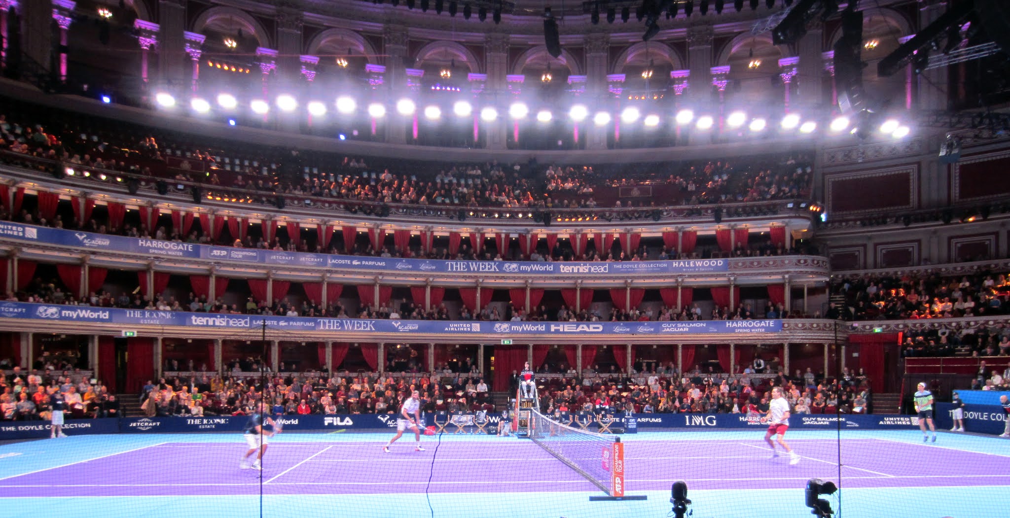 Xavier Malisse and Goran Ivanisevic at the net against Greg Rusedski and Tommy Haas at myWorld Champions Tennis