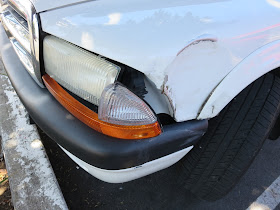 Collision damage on front corner of Dodge Dakota.