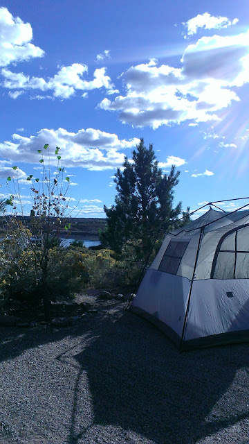 sky, clouds, tent, and trees with a view of the water in Echo Canyon Nevada