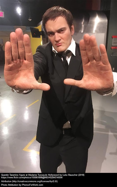 Quentin Tarantino showing his hands