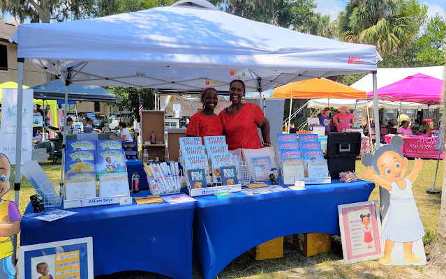 Florida author PeTika Tave with her daughter Zandria at the community festival at the AME Church in St. Augustine