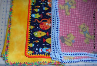 3 fleece blankets with crocheted edgings