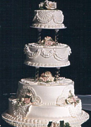 I've collected quite a few lovely wedding cakes and chopped off everything