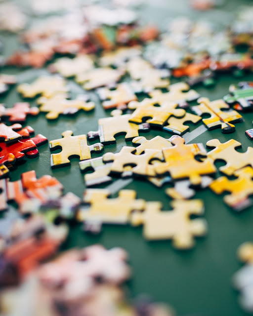 Jigsaw puzzle pieces for a family game night.