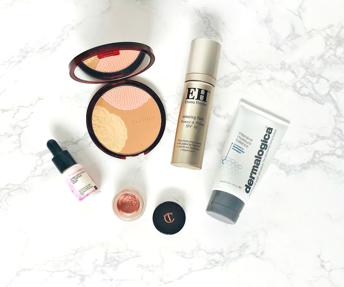 Dermalogica Intensive  Moisture Balance, Charlotte Tilbury Eyes to Mesmerise, Emma Hardie Amazing Face protect & Prime, Freshly Cosmetics Hyper Concentrate Eye Contour Serum, Clarins Bronzing Compact 001 Sunset Glow