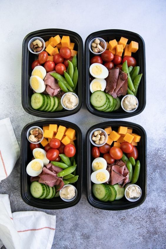 These Protein Snack Packs are filled with hard-boiled eggs, almonds, hummus, and crunchy veggies. An easy and delicious Lunch Meal Prep Solution perfect for any protein lover, these fantastic little protein snack packs are perfect for school lunches, post-workout snacks, or picnics in the park.For these Protein Snack Packs, I use these Single Compartment Containers.