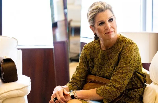 Queen Maxima wore a green lace outfit, topa nd skirt, by Natan. The Queen met with First Lady Dominique Ouattara