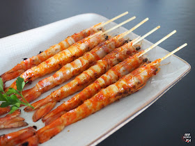 Langostinos a la plancha aderezados con una sabrosa y picante mermelada de chiles