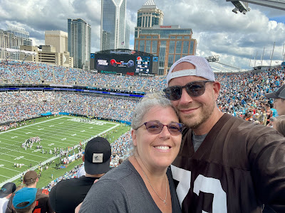 Selfie of me and your dad inside the stadium at our seats.