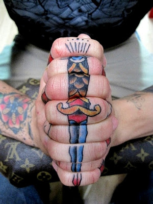 tattoo on knuckles sword