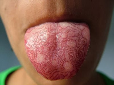 Bizarre and Strange Tongue Tattoo