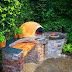 Tandoor oven, prep space and Pizza oven all in one! This will be a must-do project once we buy a place.