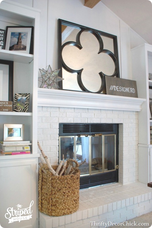 painted brick fireplace and built ins