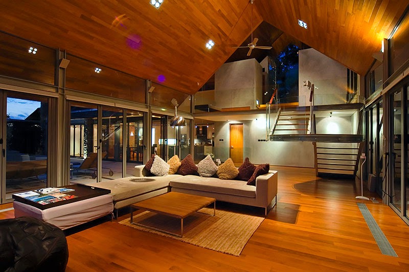 Living room in Villa with contemporary Asian design at night