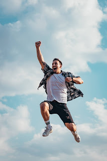 Man jumping in celebration.