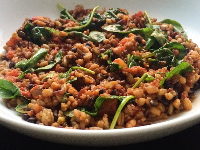 Superfood grains with spinach and tomatoes