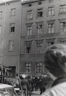 Oct. 7, 1961. Four-year-old Michael Finder of East Germany is tossed by his father into a net held by residents across the border in West Berlin. The father, Willy Finder, then prepares to make the jump himself.