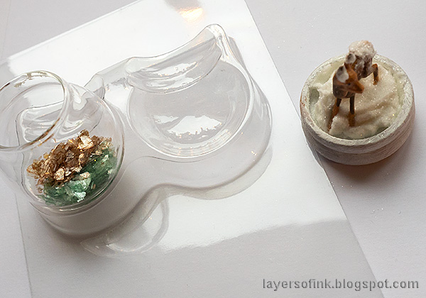 Layers of ink - Christmas Forest with Snowglobe Tutorial by Anna-Karin Evaldsson. Add mica to the snowglobe.