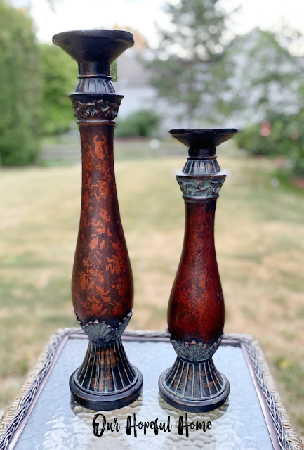 tall brown floor candle holders