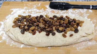 Sultana bread dough with sultanas on