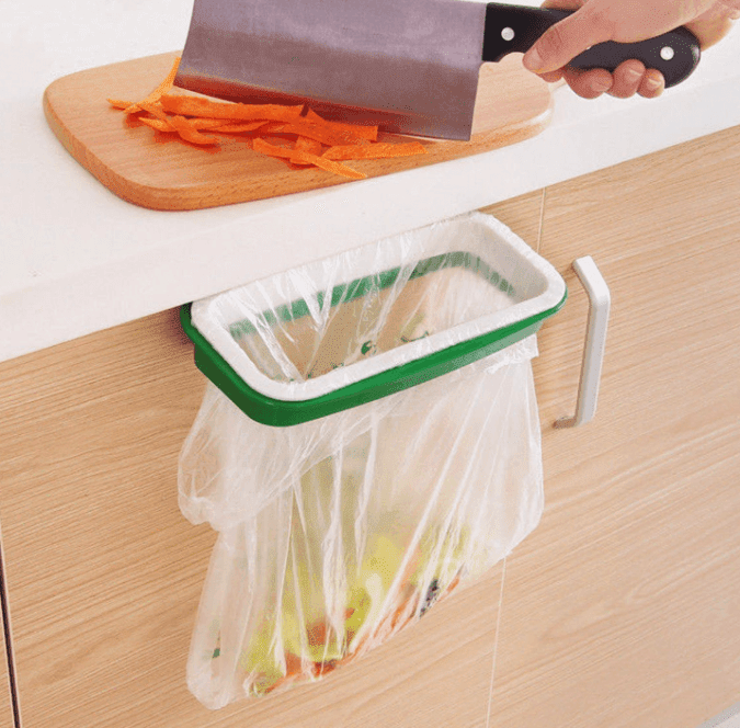 36 Genius Yet Inexpensive Products That Can Save Lives - Clean While You Cook with This Hanging Garbage Bag Holder