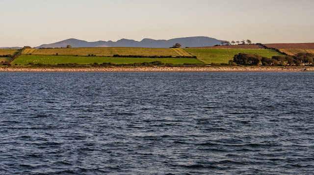 Photo of the northern fells from the Solway Firth