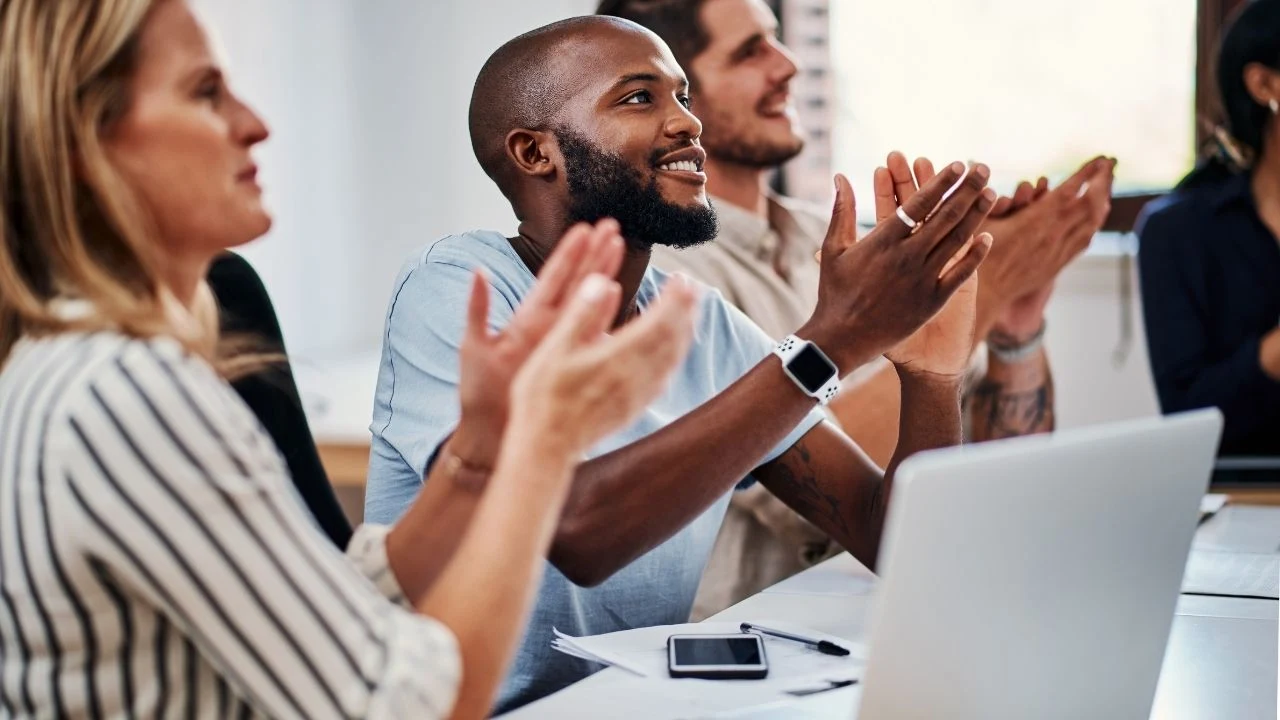 Acknowledging an achievement. Cropped shot of a group of business colleagues applauding during strategy meeting in the boardroom.