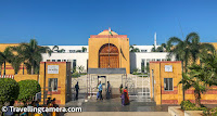 The Kalam Memorial is a memorial dedicated to the former President of India, Dr. APJ Abdul Kalam, located in Rameswaram, Tamil Nadu, India. Dr. Kalam was born in Rameswaram and the memorial is built to honour his contributions to India and his hometown.    The Kalam Memorial was inaugurated in 2017 and is built on a 2.11-acre site, with a built-up area of 2,500 square meters. The memorial consists of a central tower with a height of 27 meters, which symbolizes Dr. Kalam's belief in the power of youth. The tower is surrounded by 12 pillars, which represent Dr. Kalam's dedication to the 12 states of India.