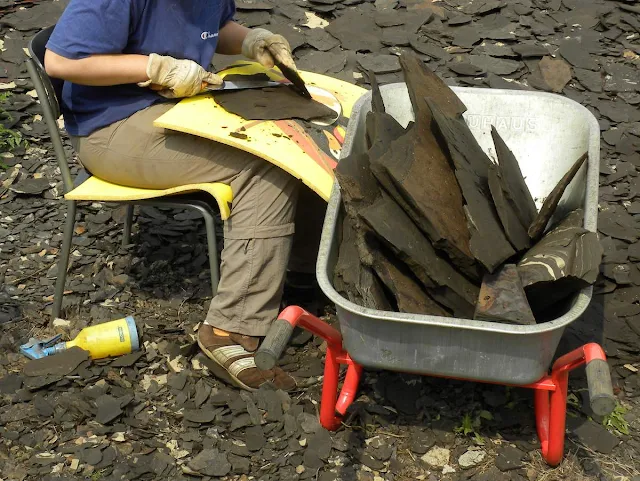 Splitting shale with a large knife