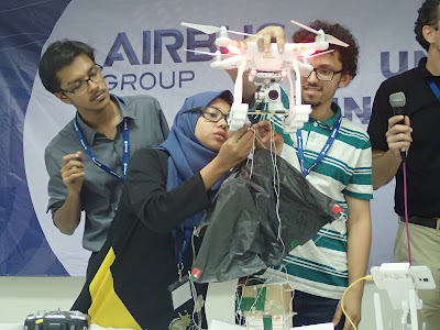 Team International Islamic University Malaysia explaining to the judges how their drone would work.