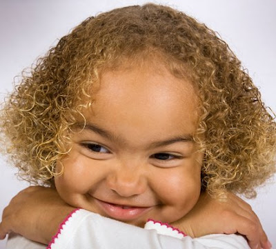 Photo of natural Curly Short Hair in African American hairstyle is as below.