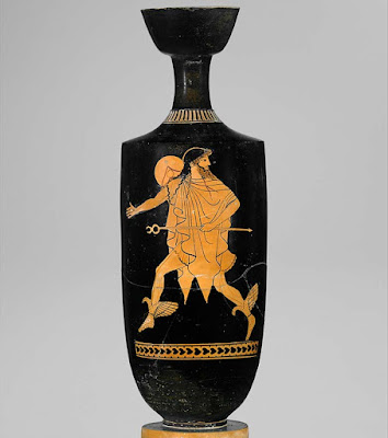 Hermes, wearing winged sandals and holding the caduceus