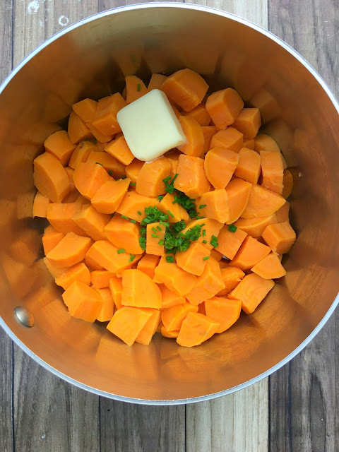 Mashed sweet potatoes with coconut yogurt and chives. The perfect Thanksgiving side dish recipe. | www.jacolynmurphy.com