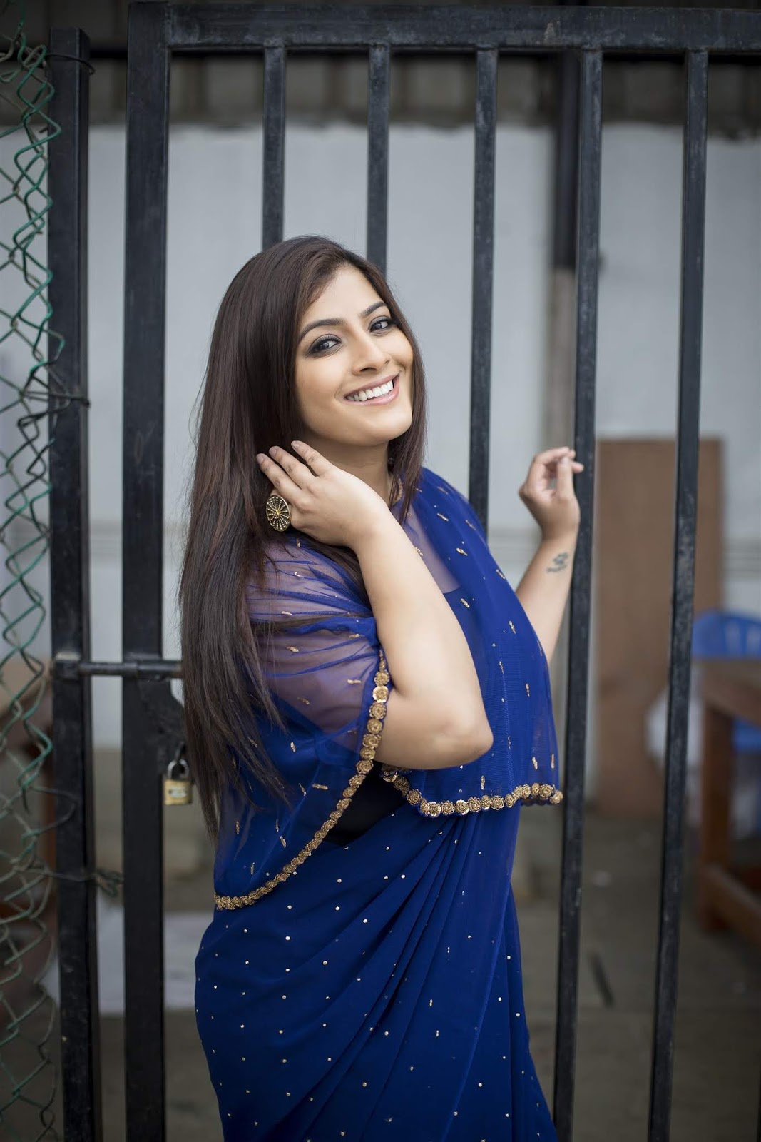 Actress Varalaxmi Latest Photoshoot In Blue Saree