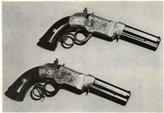 Handsome pair of .31 caliber Volcanic pistols are lightly engraved on brass frames. Style of gun is somewhat more sophisticated artistically than iron-frame S & Ws, but mechanism is fundamentally same. Guns are new, having been preserved in Winchester collection to this day. Larger sizes and a pistol- carbine with detachable stock were also made, as well as rifles.