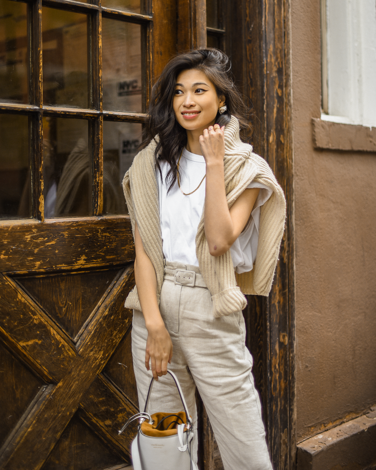 Belted linen trouser with ribbed knit sweater, Spring casual style, neutral spring outfits in New York, white bucket bag outfit ideas, Spring outfits layering, transitional style - FOREVERVANNY.com