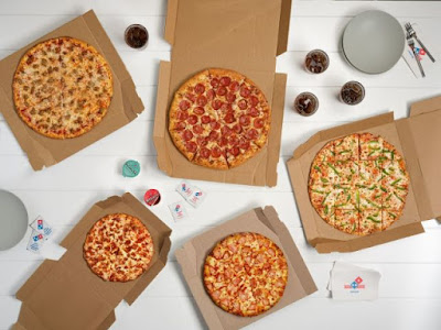 A selection of five Domino's pizzas.