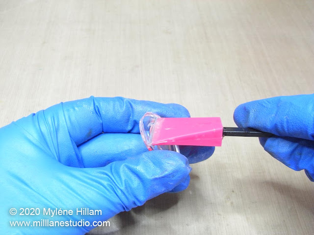 Removing a silicone stirrer from the cured resin left in the bottom of a cup