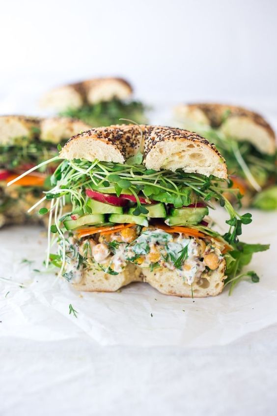 Spring Goddess Sandwich with herby chickpea salad, crunchy carrots & radishes, cucumber, avocado and sprouts. Vegan and Gluten-free adaptable!