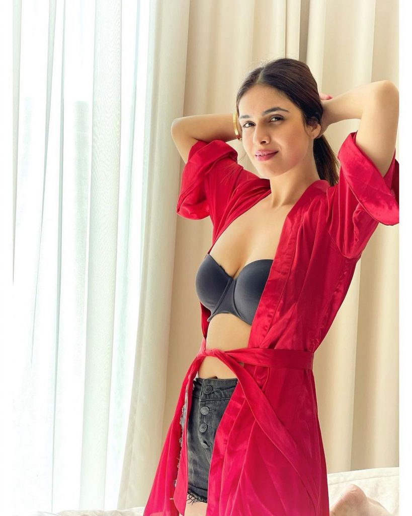 Actress Pics: Neha Malik Unique Styling Of Denim Shorts With A Satin Robe