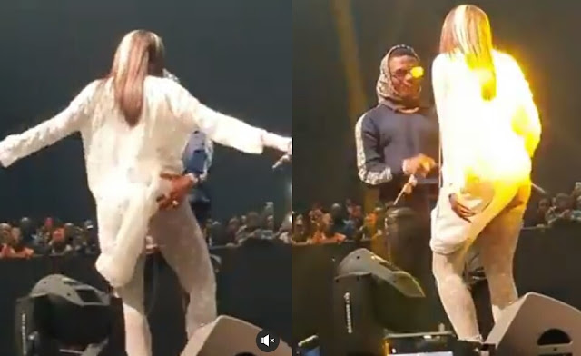 Wizkid Grabs Tiwa Savage’s Backside On Stage In Dubai