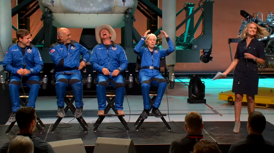 The crew of Blue Origin first commercial flight at a post-flight press conference: Oliver Daemen, Mark Bezos, Jeff Bezos and Wally Funk. Ariane Cornell was the master of ceremony. Blue Origin, 20 July 2021.