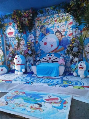 dekorasi pernikahan doraemon terbaru